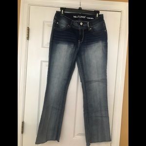 Boot cut custom trimmed jeans tag says lucious curvy fit